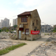 Image for article titled Unbelievable “nail houses” around the world